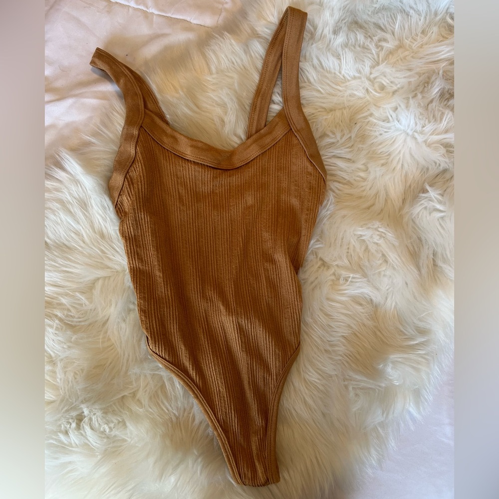 Out from under bodysuit